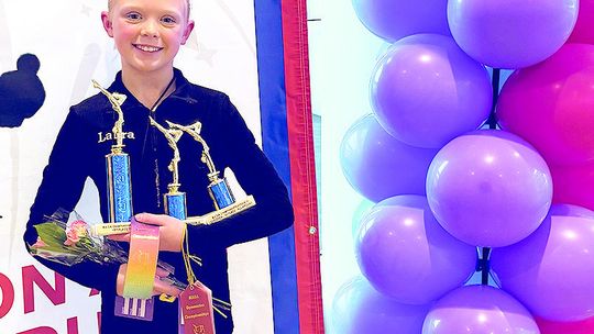 LAURA STICKS IT AT BIG TOURNEY