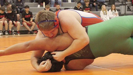 Panther wrestlers 3-2 across the border