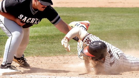YANKS TRIPPED UP BY TIGERS