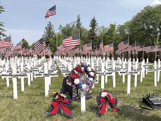 Pastor Ryan Petersen addresses gathering at Bethel Cemetery