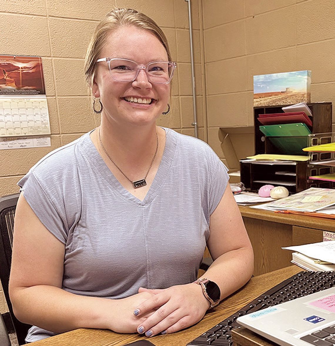 A mom Behind the desk at SMS A mom Behind the desk at SMS